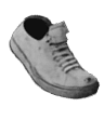 Shoe on top of garbage pile